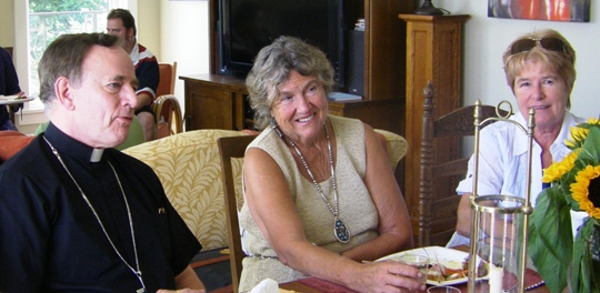 Archbishop Michael Miller chatting with Sheila Hunter and Diana Taylor on Bowen Island, July 31, 2011.