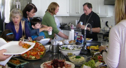 Trinity Howard, Cecilia Bay, Mary Paré, Aidan Paré, Rosemary Anderson, and Acrchbishop Michael Miller at a potluck hosted by Gayle Stevenson and Michael Cornelissen at Valhalla.