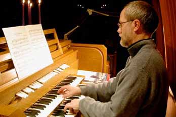 Darryl Nixon, Music Minister of St. Andrews-Wesley, playing the Saint Gerard's organ. Roman Izdebski photo.